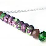 Green and purple stick neck..