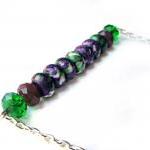 Green and purple stick neck..