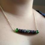 Green and purple stick neck..